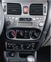 Obrázek z ISO redukce pro Nissan Almera 03/2000 - 11/2006 včetně ovládání větrání 